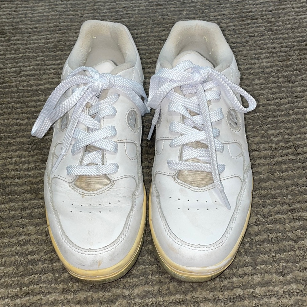 White, Wilson sneakers.